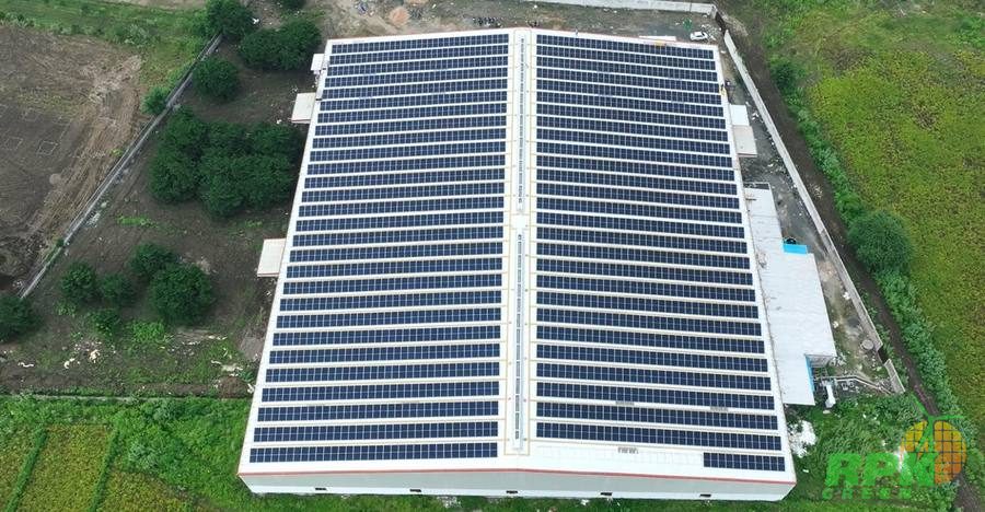 Completed rooftop solar installation, drone view